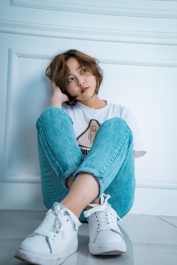 Woman Wearing Jeans And White Shirt