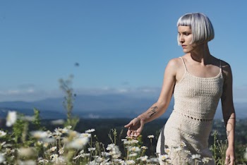 Woman Wearing Knitted Dress Near Flowers