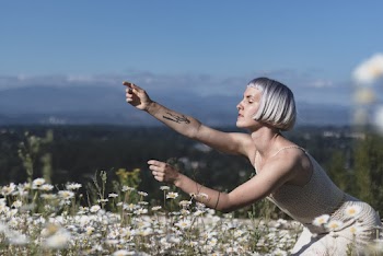 Woman Wearing Knitted Dress Near Flowers