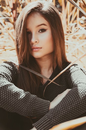 Woman Wearing Knitted Sweater