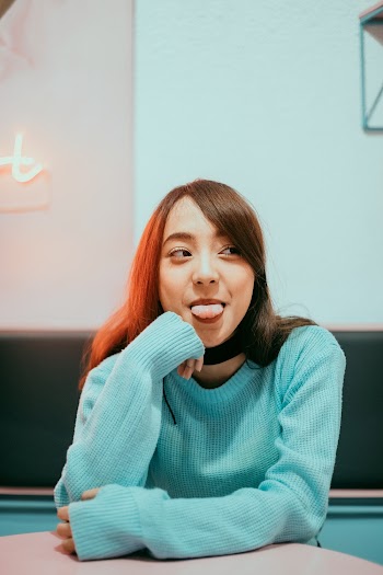 Woman Wearing Knitted Sweater