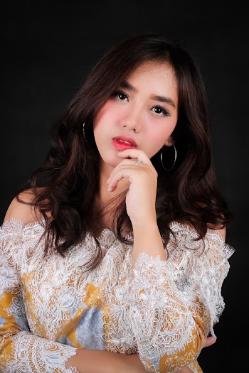 Woman Wearing Lace Top