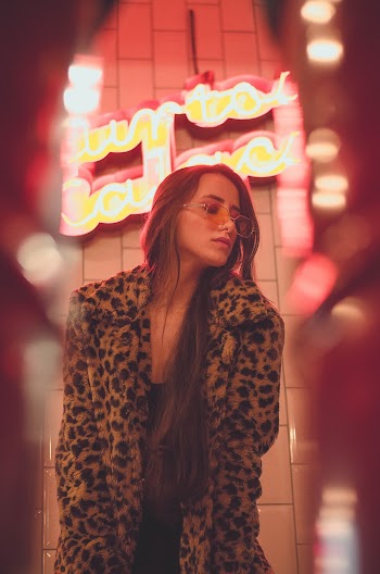 Woman Wearing Leopard Coat