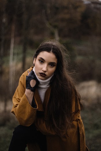 Woman Wearing Long Brown Coat