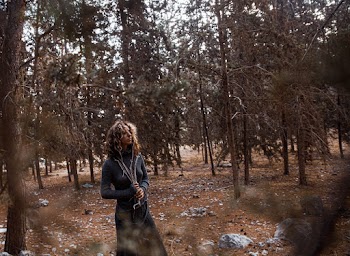 Woman Wearing Long Sleeved Clothing Standing Near Trees