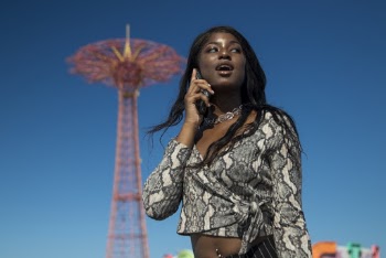 Woman Wearing Long-Sleeved Crop Top