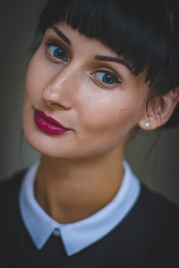 Woman Wearing Makeup and Collared Shirt