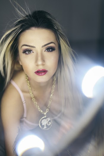 Woman Wearing Makeup Near Lights