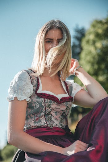 Woman Wearing Maroon And White Floral Dress