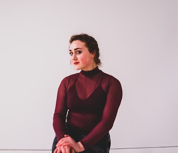 Woman Wearing Maroon Long-sleeved Dress