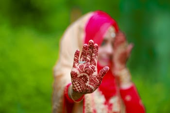 Woman Wearing Mehndi Tattoos