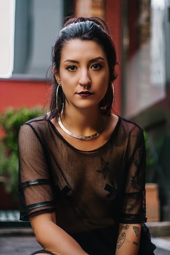 Woman Wearing Mesh Top