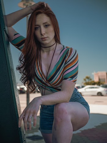 Woman Wearing Multi-colored Crop-top