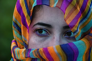 Woman Wearing Multi-coloured Headscarf