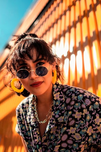 Woman Wearing Multicolored Floral Collared Top