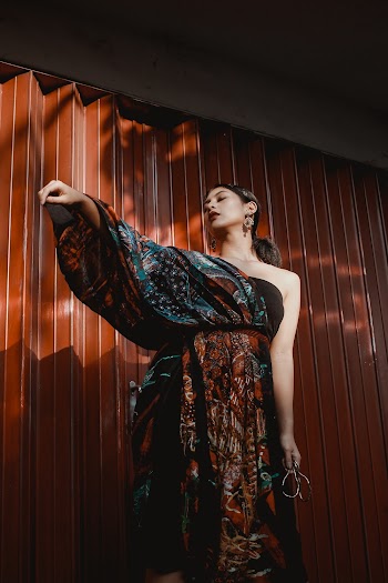 Woman Wearing Multicolored Floral Dress