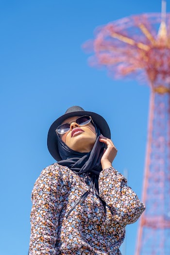 Woman Wearing Multicolored Floral Long-sleeved Shirt