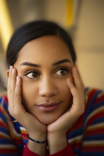 Woman Wearing Multicolored Striped Top
