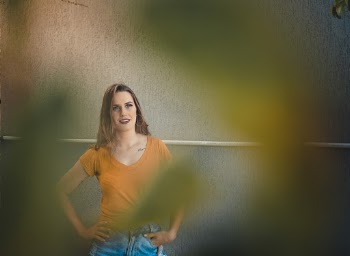 Woman Wearing Mustard Coloured Top
