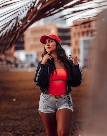 Woman Wearing Neon Orange Top