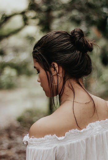 Woman Wearing Off-Shoulder Blouse