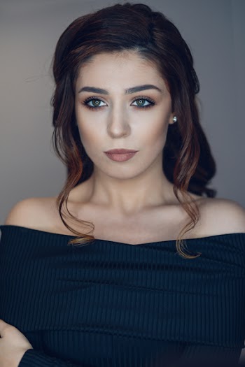 Woman Wearing Off-shoulder Top