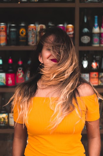 Woman Wearing Off-shoulder Top