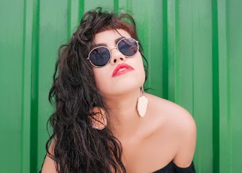 Woman Wearing Off-shoulder Top Posing