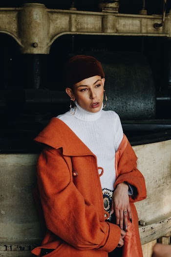 Woman Wearing Orange Coat 