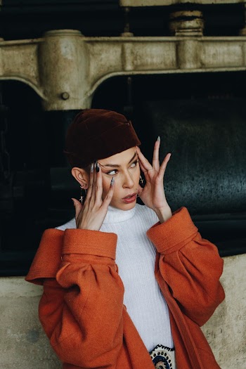 Woman Wearing Orange Coat