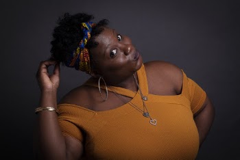 Woman Wearing Orange Cold-shoulder Top