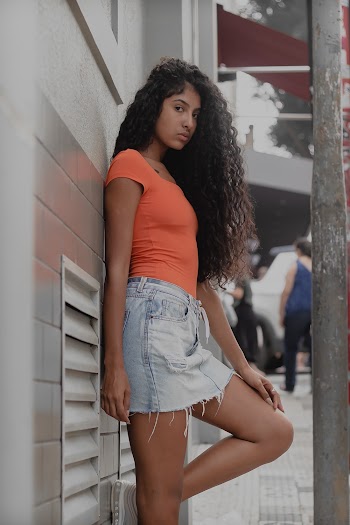 Woman Wearing Orange Crew Neck Shirt