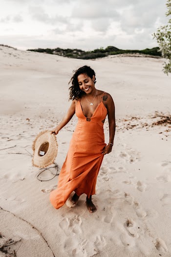 Woman Wearing Orange Spaghetti Strap Dress