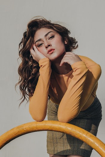 Woman Wearing Orange Sweater
