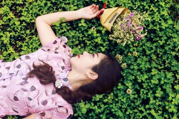 Woman Wearing Pink and Black Floral Blouse