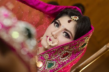 Woman Wearing Pink and Multicolored Scarf