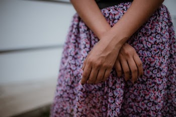 Woman Wearing Pink and Purple Skirt