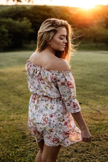 Woman Wearing Pink and White Floral Off-shoulder Mini Dress