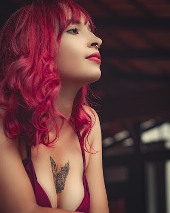 Woman Wearing Pink Brassieres