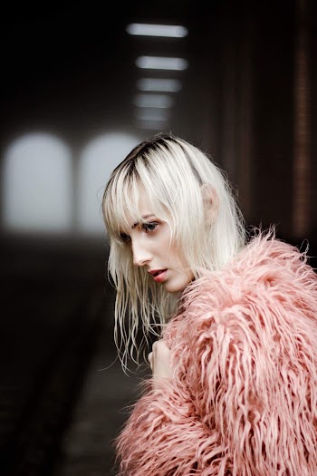 Woman Wearing Pink Fur Coat