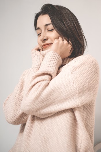 Woman Wearing Pink Knitted Sweater