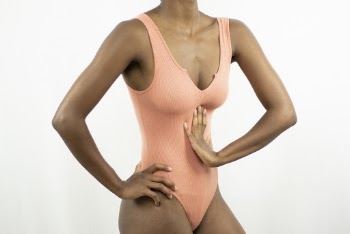 Woman Wearing Pink One-piece Swimsuit