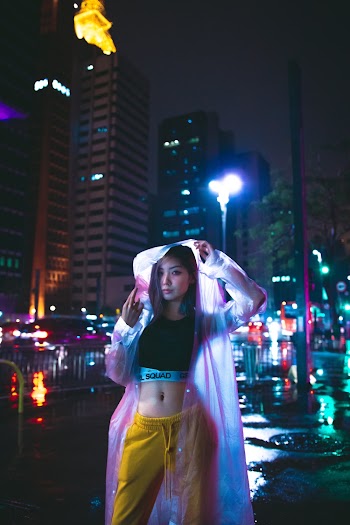 Woman Wearing Pink Rain Coat 