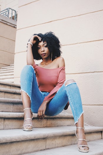 Woman Wearing Pink Scoop-neck Top Sitting on Stair