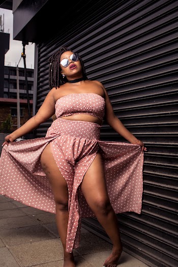 Woman Wearing Pink Silt Skirt and Bra