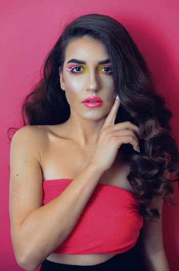 Woman Wearing Pink Strapless Crop-top