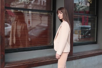 Woman Wearing Pink Suit