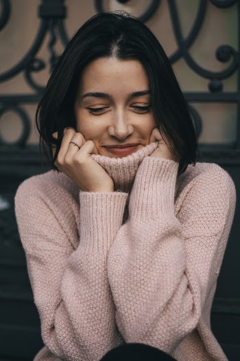Woman Wearing Pink Sweater