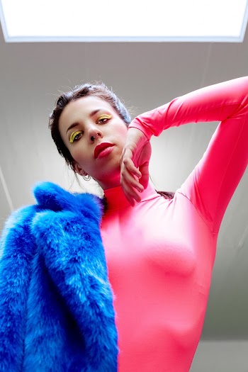 Woman Wearing Pink Turtle-neck Long Sleeve Shirt