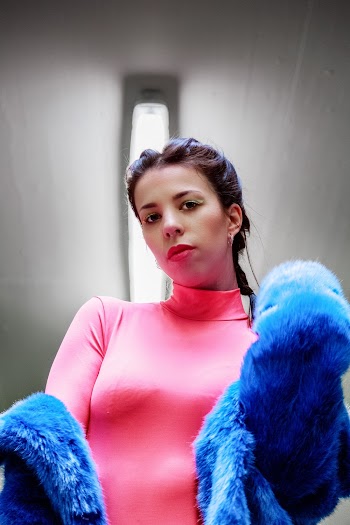 Woman Wearing Pink Turtleneck Shirt